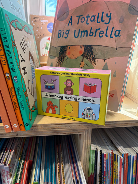 A Monkey Eating a Lemon