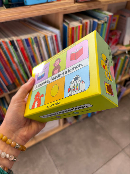 A Monkey Eating a Lemon