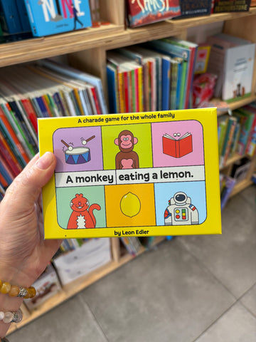 A Monkey Eating a Lemon