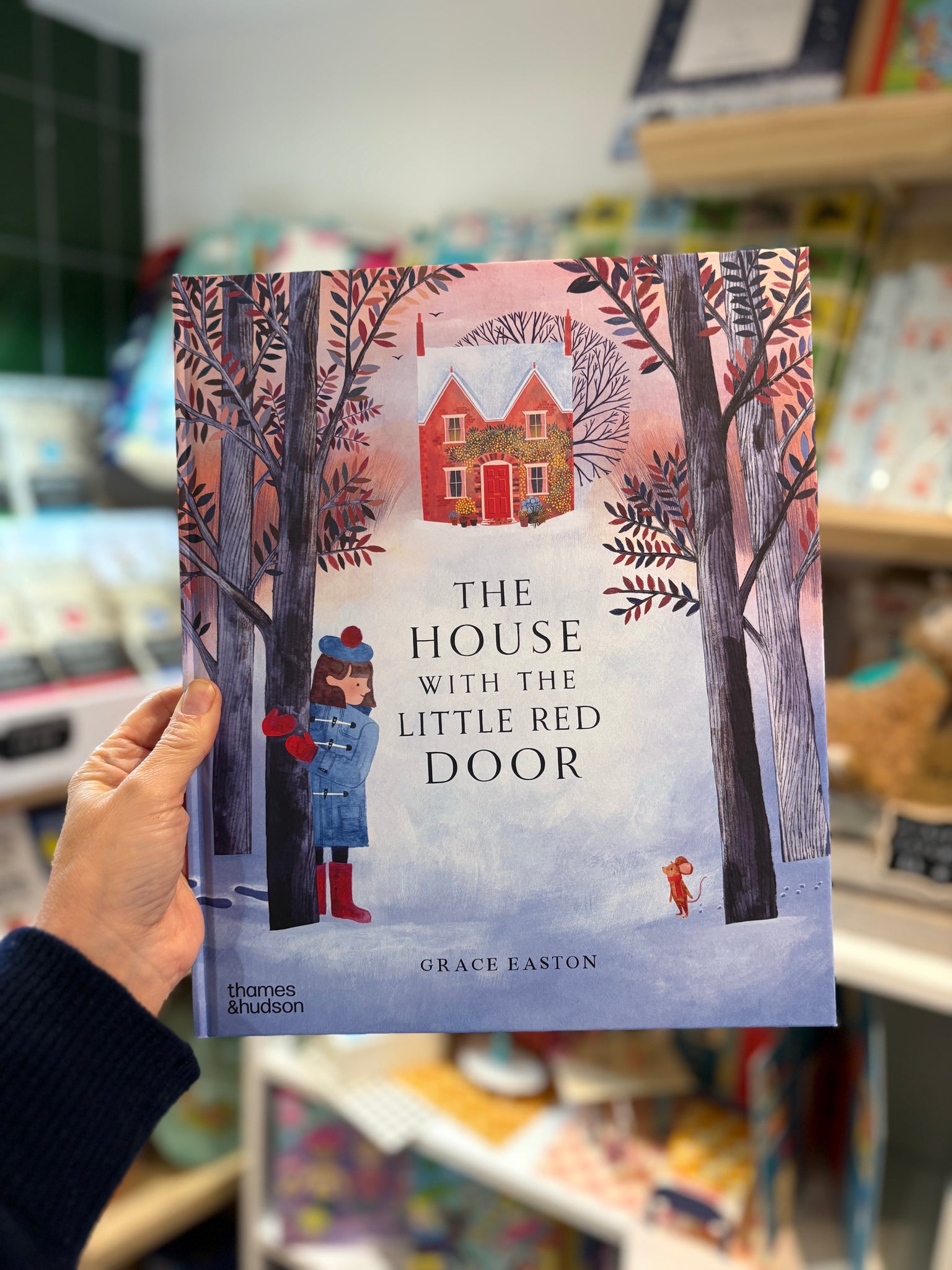 The House With The Little Red Door