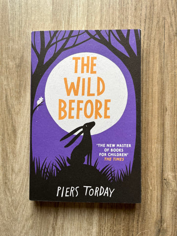 The Wild Before book cover with silhouette of hare looking up at the moon